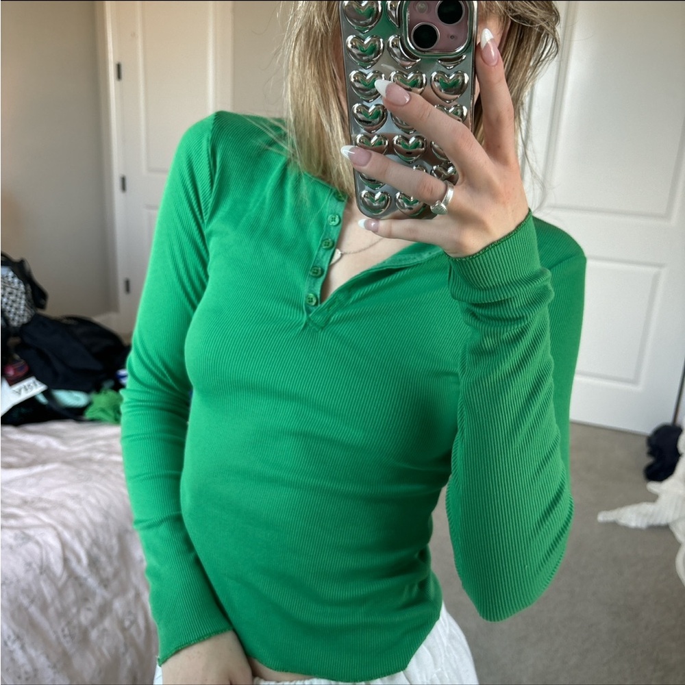 green long sleeve top
